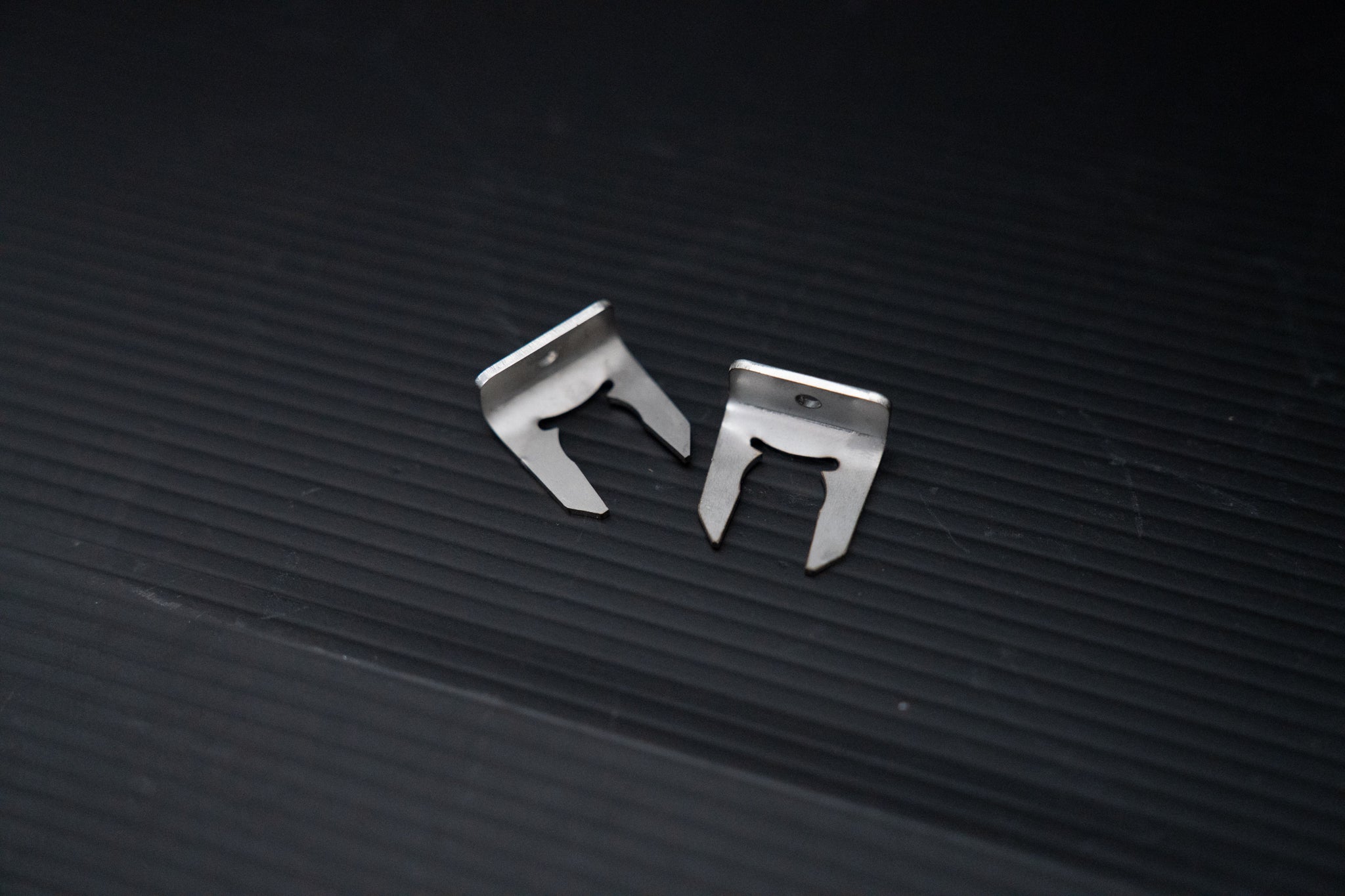 Parking brake retaining clips