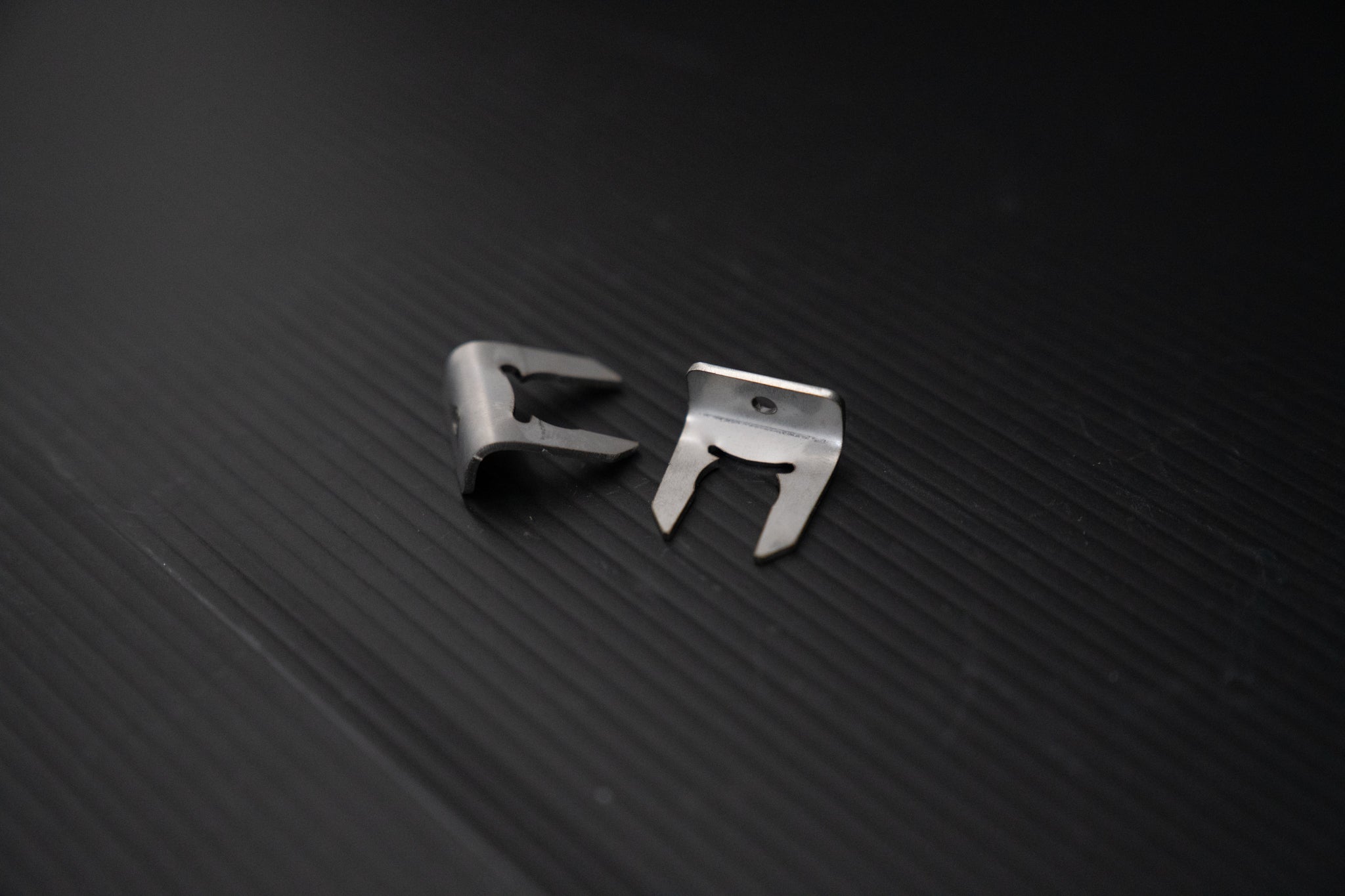 Parking brake retaining clips